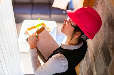 Contractor Inspecting a Home